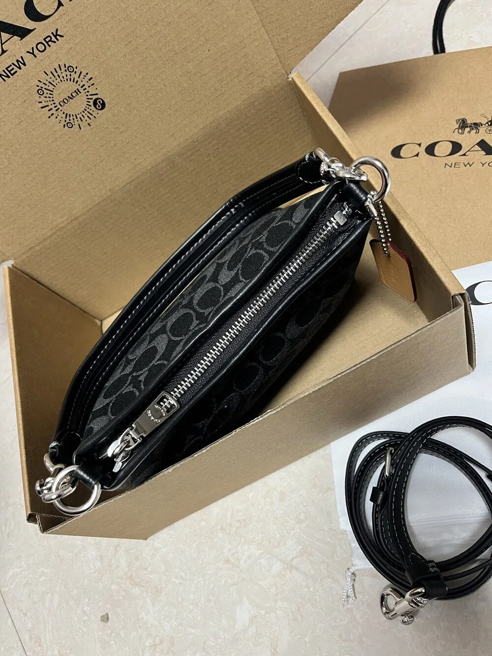 Coach black mini backpack